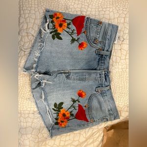 Levi’s embroidered Jean shorts.